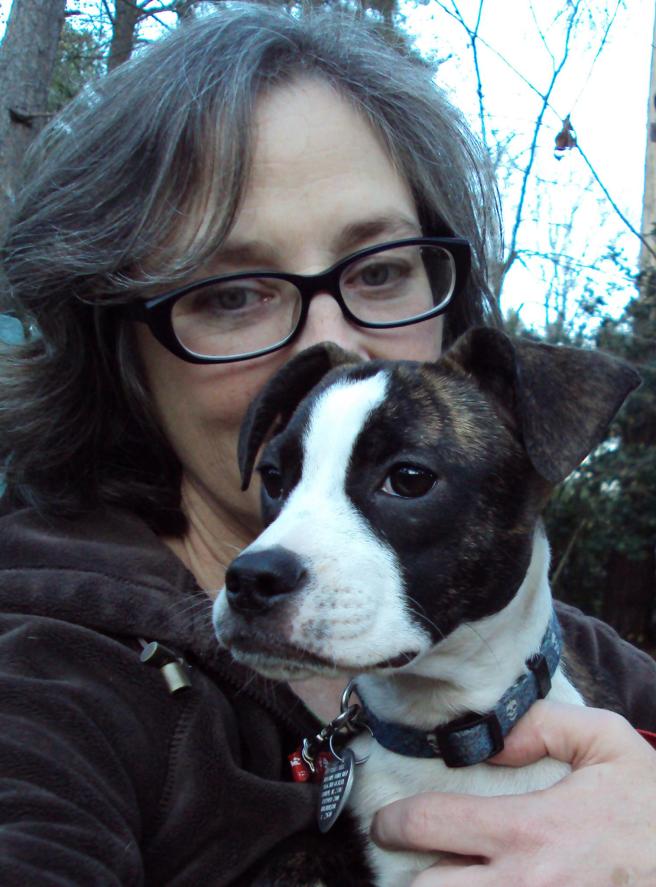 Submitted by Lisa:  "This is me with my foster half-Boston Jujube."